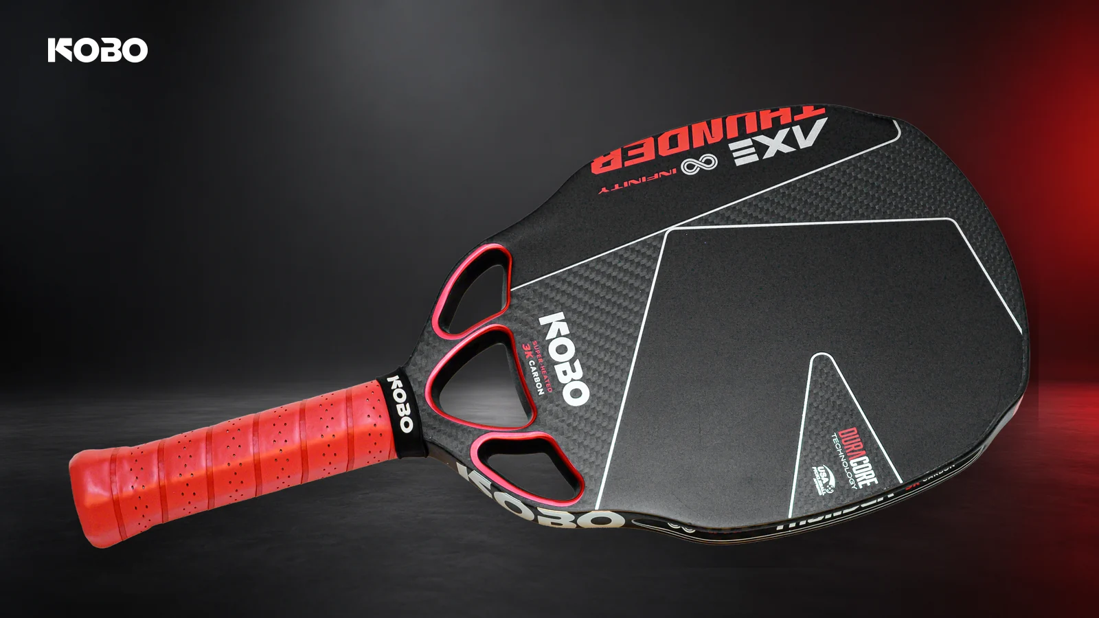 Official KOBO THUNDER AXE Infinity paddle with red grip and three air channels against a dark studio background.
