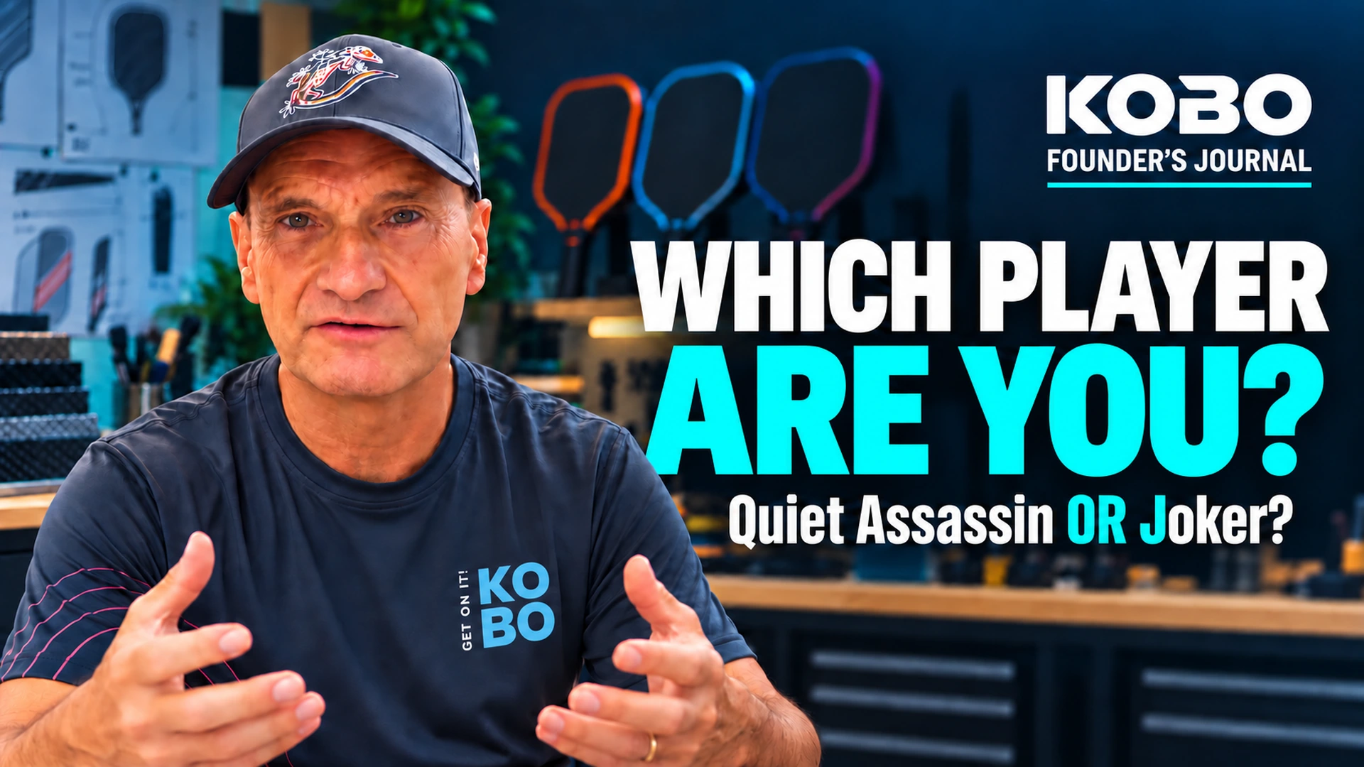 Mark Shields wearing his KOBO shirt and gecko cap. Which player are you? Quiet Assassin or Joker?