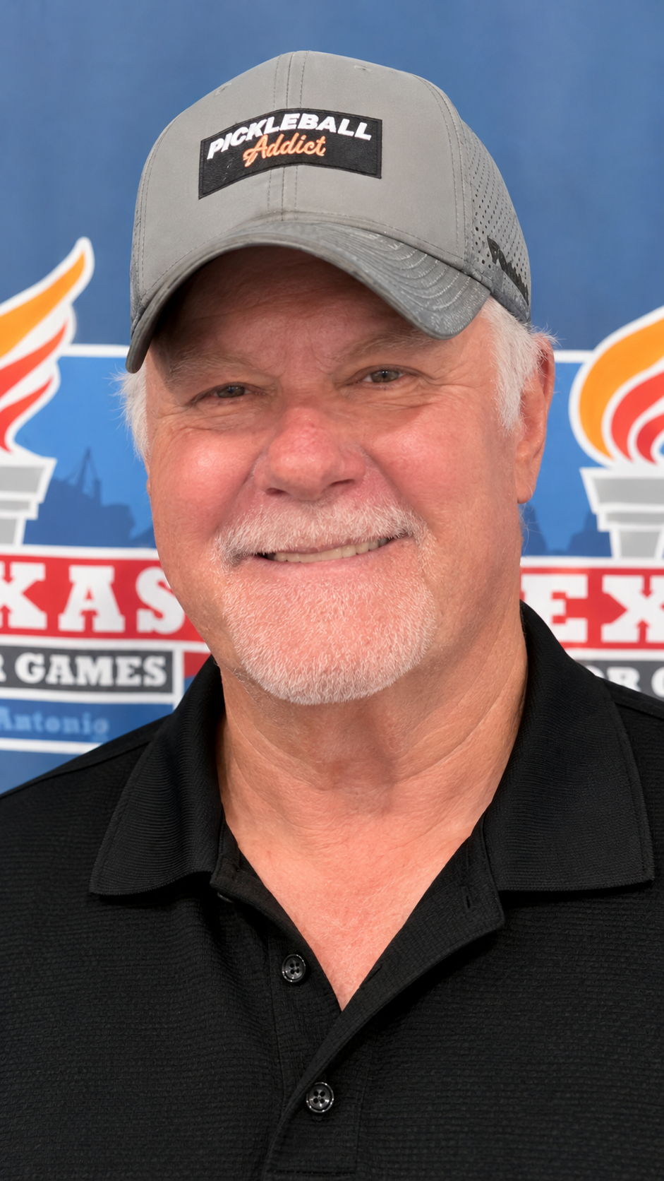 Tracy Davis wearing his pickleball cap